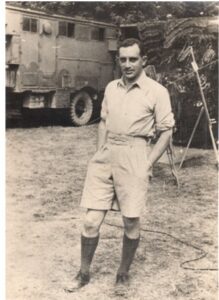 Man standing in khakis.