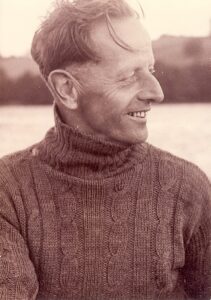 A middle-aged man in profile wearing a turtleneck.