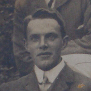 Young man in Edwardian clothes.