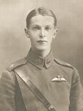 Young man in a military uniform.