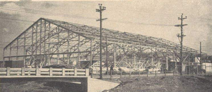 Black and white photograph of the stadium under construction.