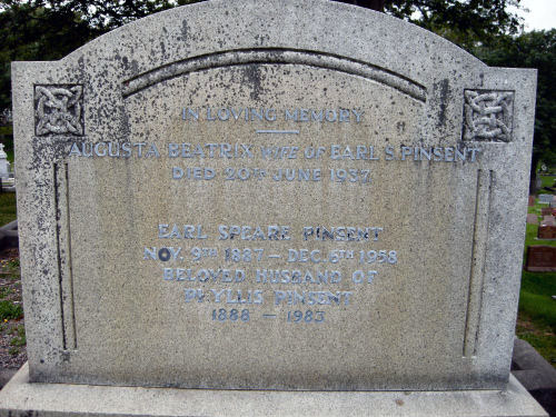 Granite gravestone spotted with lichen.
