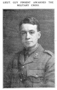 A faded newspaper photo of Guy as a cleanshaven young man in a military uniform.