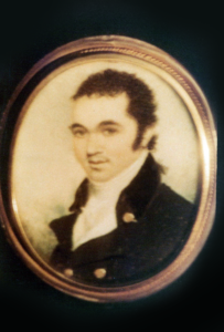 1700s portrait of a man with dark hair and a cravat.