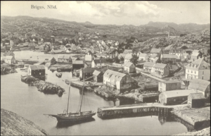 A black and white photograph of the waterside town of Brigus