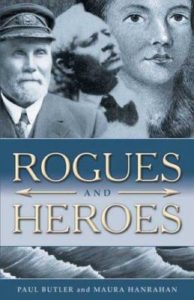 A scanned book cover in shades of grey and blue. It shows several faces, including the drawing of a woman and a man in 1900s attire, above a drawing of waves. The title reads Rogues and Heroes, Paul Butler and Maura Hanrahan.