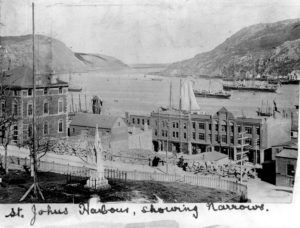 Faded black and white photo of St. John's Harbour.