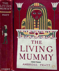 Scanned cover of a red book featuring a painted sarcophagus. It is titled The Living Mummy with the author listed as Ambrose Pratt. The spine features a figure drawn in profile in an Egyptian style.